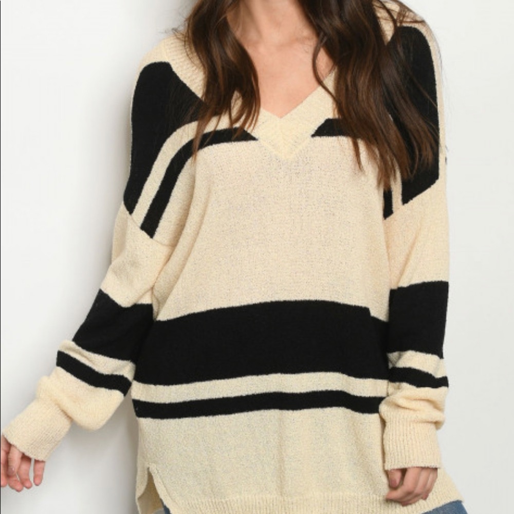 Black and cream striped sweater